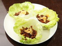  Beef strips stir-fried in sweet miso sauce, served wrapped in fresh lettuce. 