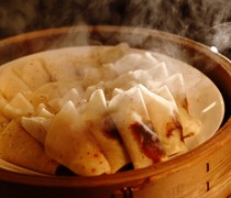 VIEW&DINING THE SKY_Peking Duck - Highlighting the chef's masterful technique.