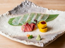  13,200 JPY Course - masterfully integrates Edomae sushi with a delightful selection of seasonal dishes, skillfully balancing tempo and flavors 