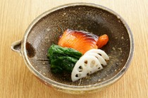  "Salmon marinated in Saikyo miso, sautéed crinkled spinach, and pickled lotus root" 