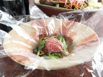 Bifteck Kawamura Premium Kitashinchi restaurant_A sophisticated dish wrapped and steamed in a heat-resistant sheet: "Specially Selected Japanese Black Beef Wrapped and Simmered Sukiyaki Style"