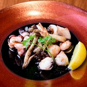  Grilled local octopus and mushrooms with garlic butter 