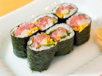  The exquisite balance of tuna's umami and two types of pickled radish in the "Premium Bluefin Tuna Collar and Pickled Radish Roll" 