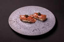 Grilled Wagyu beef sushi topped with caviar