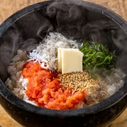 Yonpachi Gyojou Uchisaiwaicho Branch_Stone-grilled rice with mentaiko and butter