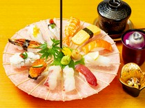 Shoku To Mori Osaka Branch_Miyabi - is a truly eye-pleasing combination of sushi. Sushi is beautifully arranged on an opened Japanese umbrella.