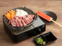  1/2 pound Matsusaka beef sirloin steak grilled on a ceramic plate 