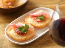  Bruschetta with Prosciutto and Shio Koji Tomato Sauce - It is a popular dish among women, featuring housemade shio koji tomato sauce topped with prosciutto. 