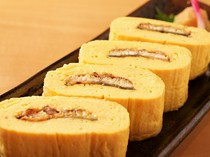  Eel Egg Roll - A hearty, satisfying specialty dish. 