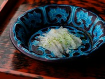  Sashimi - The fish is aged to draw out its rich umami flavor and delicately prepared. 