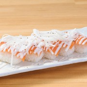 Onion and salmon nigiri sushi