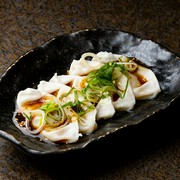  Boiled dumplings with spicy sauce (5 pieces) 