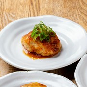 Homemade chicken meatballs with grated green onion and ponzu sauce