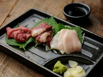 Baniku to Kaki no Sousaku Bal motto._"Horse sashimi" - rare cuts of horse meat served with homemade soy sauce