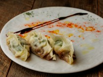 Baniku to Kaki no Sousaku Bal motto._	Oyster Gyoza - Lavishly using fresh oysters