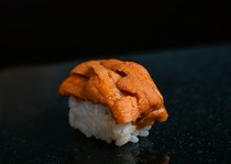 Sushi Yoshitatsu_	Sea Urchin - The gift from Hokkaido has a rich taste that melts on the tongue.