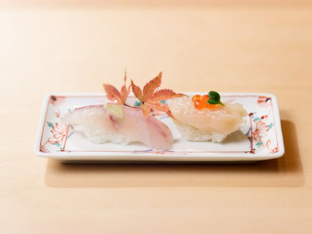 Edomae sushi featuring local fish savored at a private counter.