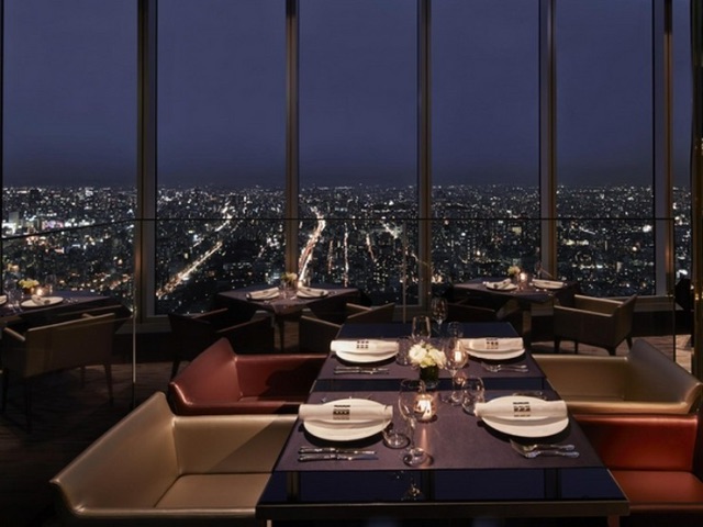 Enjoy the restaurant's specialties along with a night view of Osaka from 270 meters above the ground
