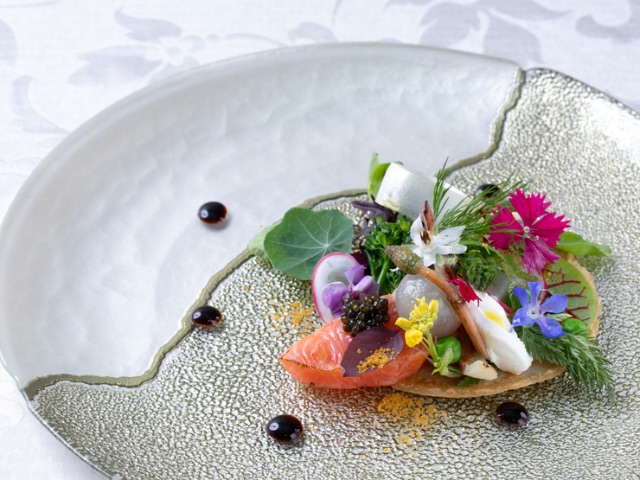 A reservation-only restaurant where guests can enjoy different genres on each floor