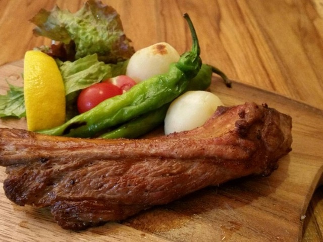 People gather for dishes made with seasonal and local ingredients