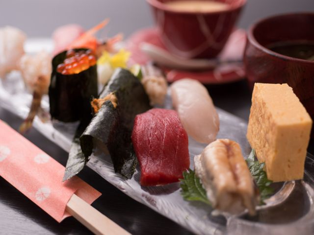 An authentic sushi restaurant that focuses on seasonal ingredients and freshness, with a warm and inviting atmosphere