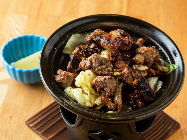 Creative chicken dishes enjoyed in a sophisticated modern space