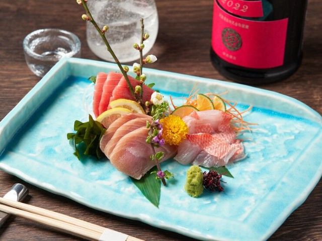Indulge in exquisite Japanese cuisine and sake in a sophisticated, stylish space.
