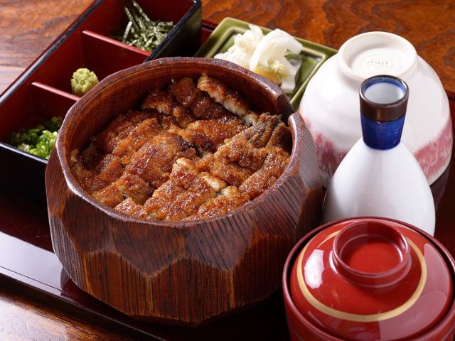 Enjoy eel grilled over binchotan charcoal and coated with a secret sauce
