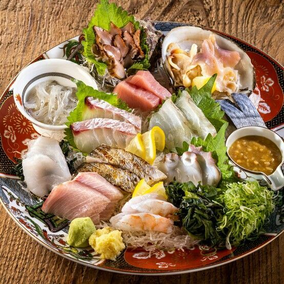 Enjoy carefully selected fresh fish and shellfish along with proud sake