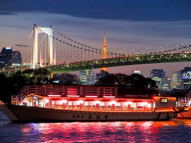 Enjoy Japanese cuisine on a traditional 'Yakatabune' boat while touring famous sites