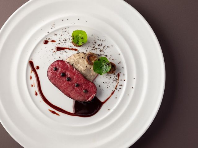 Counter-style French cuisine crafted by a whiskey distillery