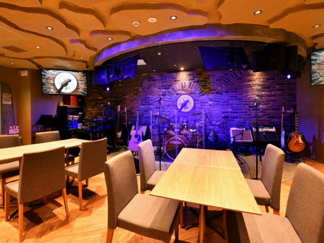 For those who find just listening unsatisfying. A restaurant where they can also sing or play instruments.