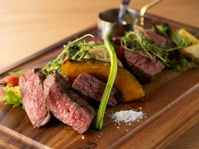 Enjoying black-haired wagyu ribeye steak with craft beer.
