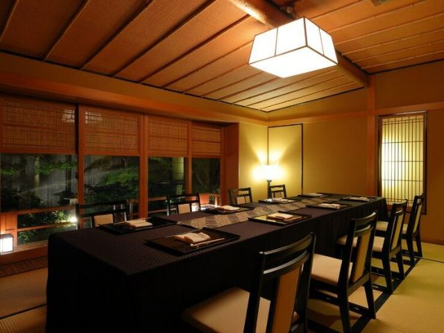 Seasonal kaiseki cuisine that blends tradition and innovation enjoyed at a hidden restaurant.