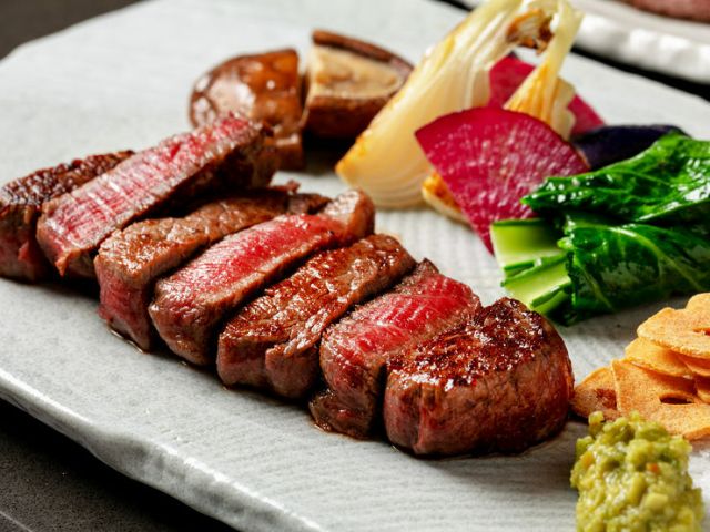 Indulge in exquisite Yamagata beef in a luxurious setting.
