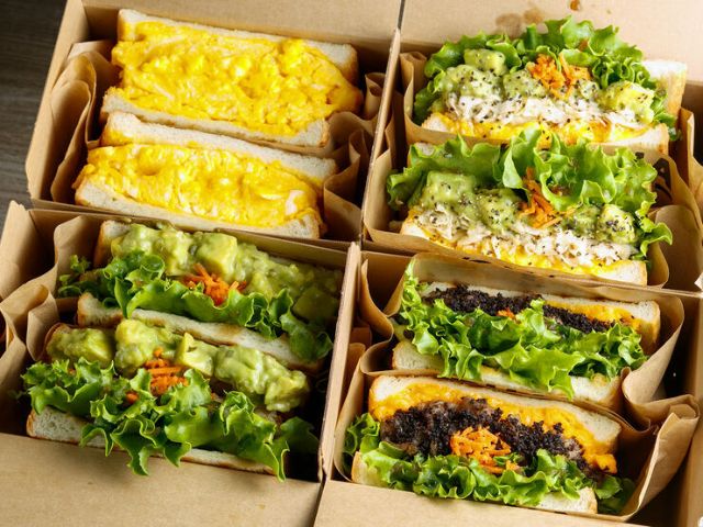 Hearty! A hot sandwich with fresh vegetables and beef.
