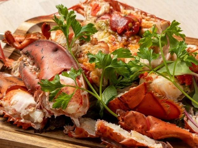 A must-try menu featuring a whole lobster.
