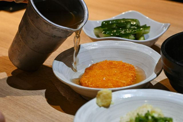 在居酒屋ちょいおでん新宿本店品尝鱧汤